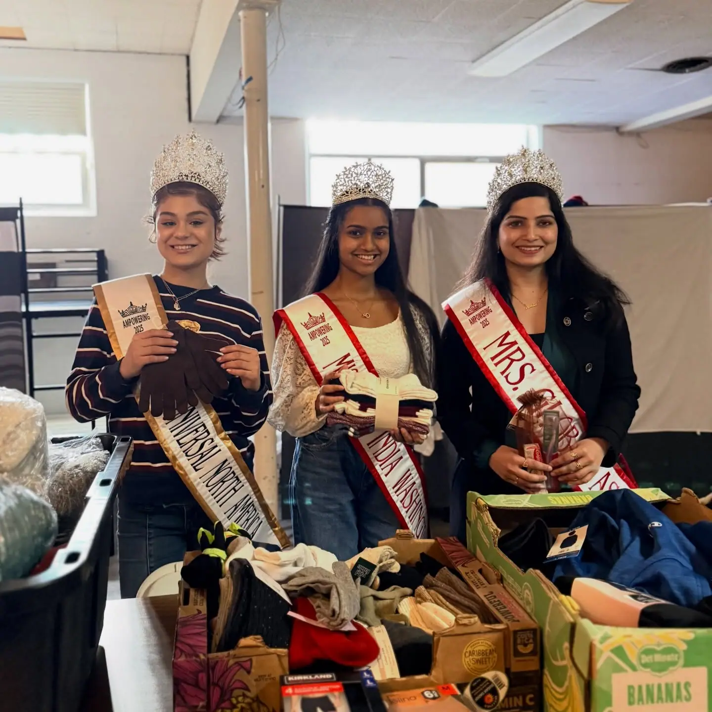 Titleholders sorting donated clothing and shoes