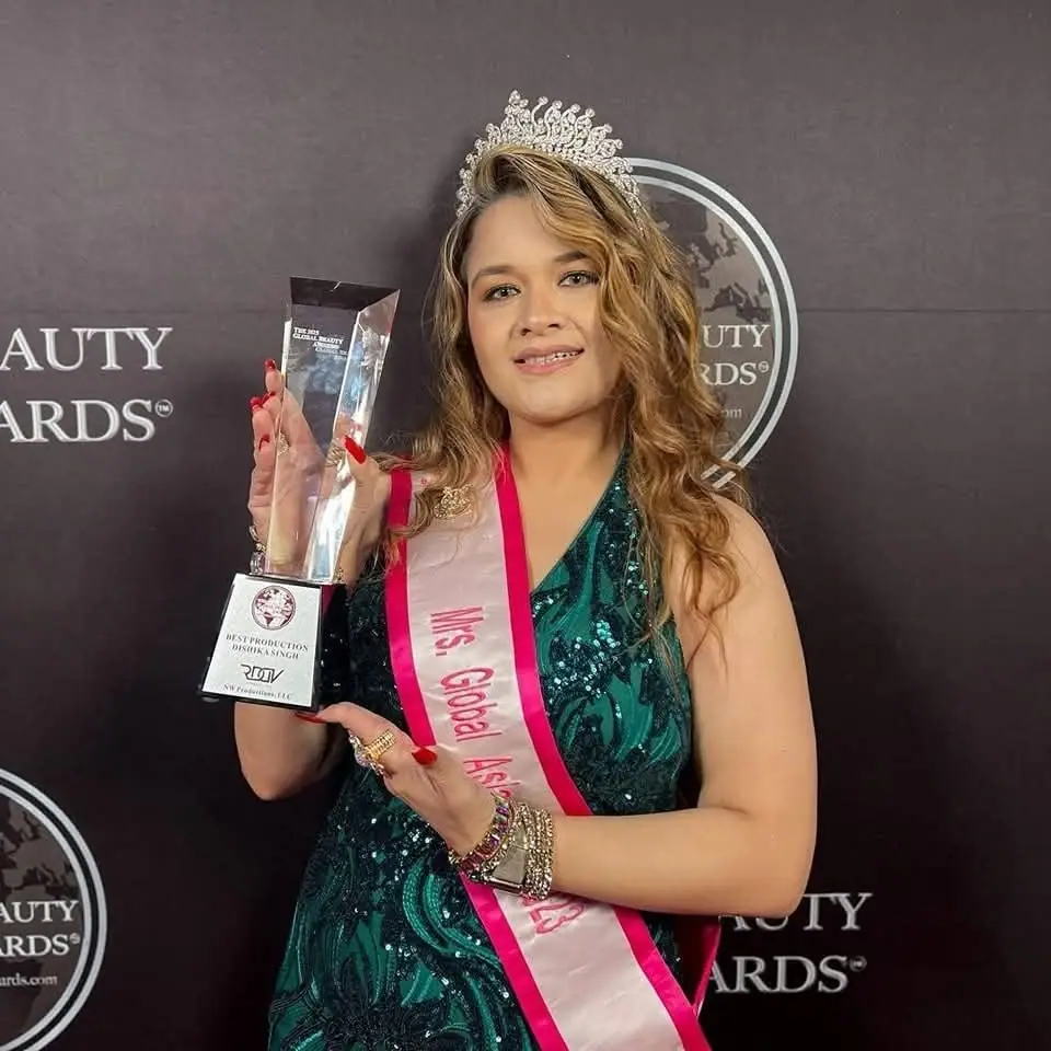 Mrs Global Asia holding a Best Production award at the 2025 Global Beauty Awards