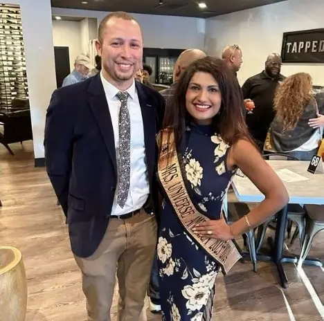 Mrs Universe America with a guest at the Mukilteo City Council Community Social